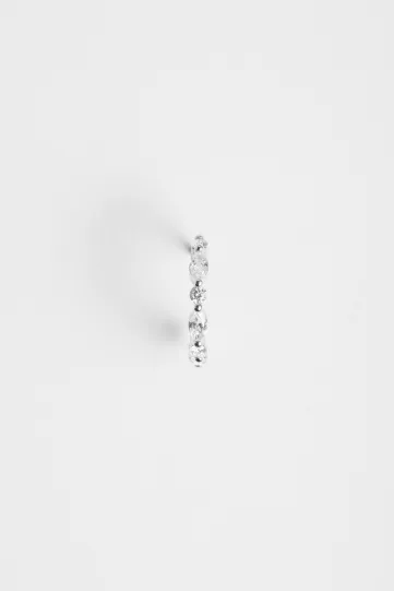 The Elodie hoop earring in 18k white gold, set with marquise and brilliant-cut diamonds, with a secure clasp.